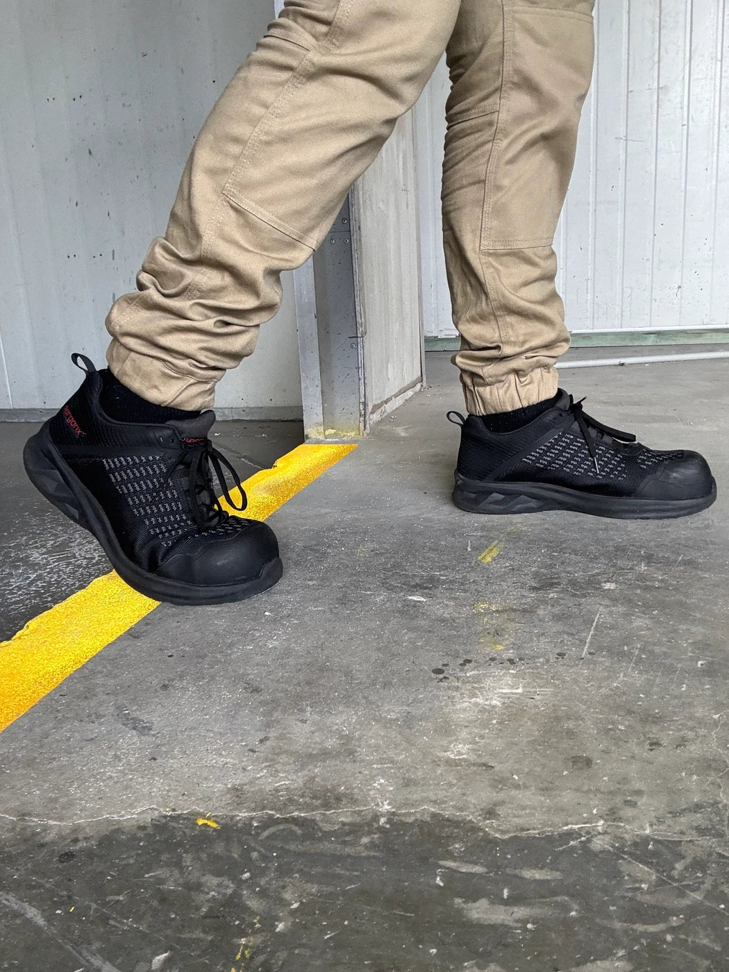Lithium safety shoes being worn while walking